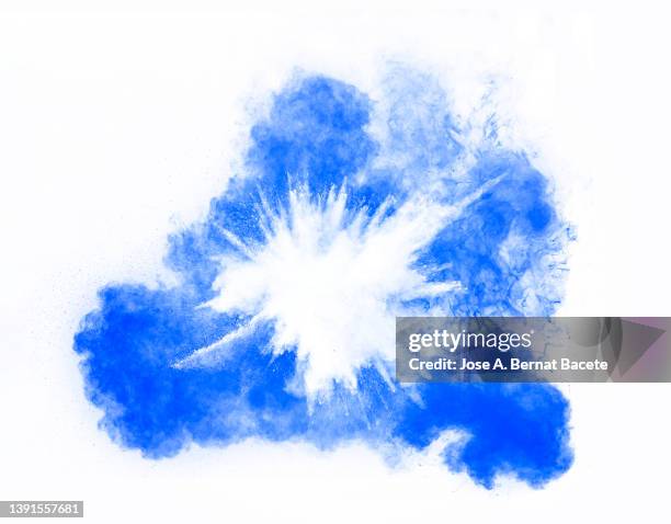 blue powder and smoke explosion on a white background. - powder blue imagens e fotografias de stock