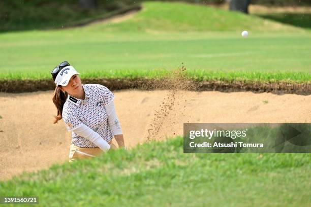 Hikari Fujita of Japan hits out from a bunker on the 7th hole during the first round of KKTcup Vantelin Ladies Open at Kumamoto Kuko Country Club on...