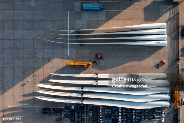 aerial view of stack of wind turbine blades - blade stock pictures, royalty-free photos & images