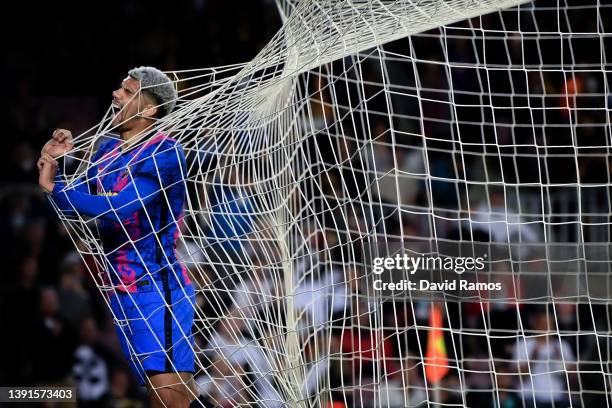 Ronald Araujo of FC Barcelona reacts inside the goal after missing a chance to score during the UEFA Europa League Quarter Final Leg Two match...