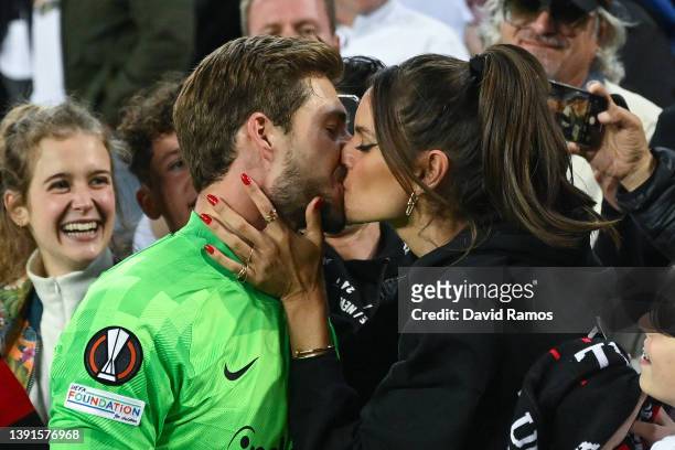 Kevin Trapp of Eintracht Frankfurt kisses his wife Izabel Goulart after the UEFA Europa League Quarter Final Leg Two match between FC Barcelona and...