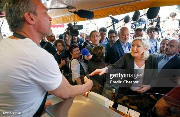 France's far-right party Rassemblement National leader, Marine Le Pen candidate for the 2022 French presidential election visits a traditional...