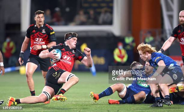 Scott Barrett from The Crusaders on the charge into Finlay Christie from the Blues during the round four Super Rugby Pacific match between the...
