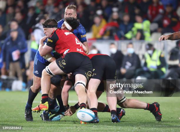 Scott Barrett from The Crusaders carges in for a high tackle on Alex Hodgman from the Blues which resulted in a red card for Barrett during the round...