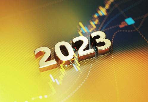 Investment And Finance Concept - 2023 Sitting On Yellow Financial Graph Background