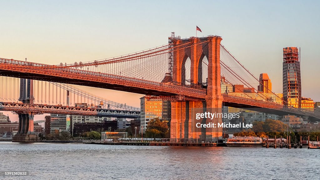Sunset View of Brooklyn Bridge and Manhattan Bridge in New York