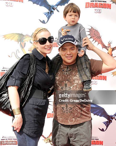 Carlos Mencia, wife Amy and son Lucas arrive at the Los Angeles Premiere of "How To Train Your Dragon" at the Gibson Amphitheatre on March 21, 2010...