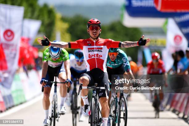 Caleb Ewan of Australia and Team Lotto Soudal celebrates winning ahead of Danny Van Poppel of Netherlands and Team Bora - Hansgrohe and Jasper...