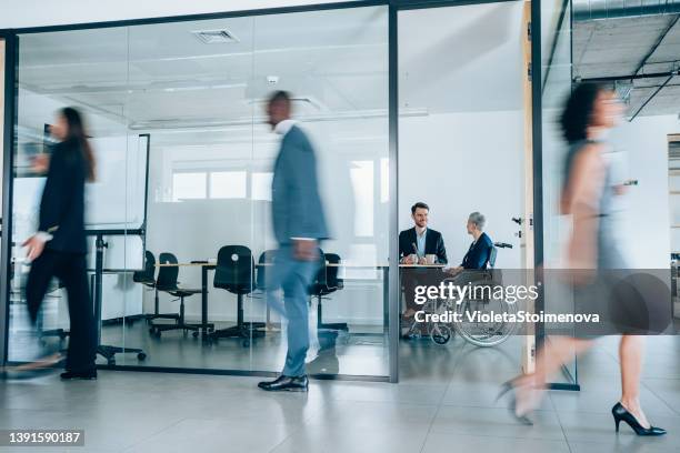business partners in meeting. - health fair stock pictures, royalty-free photos & images