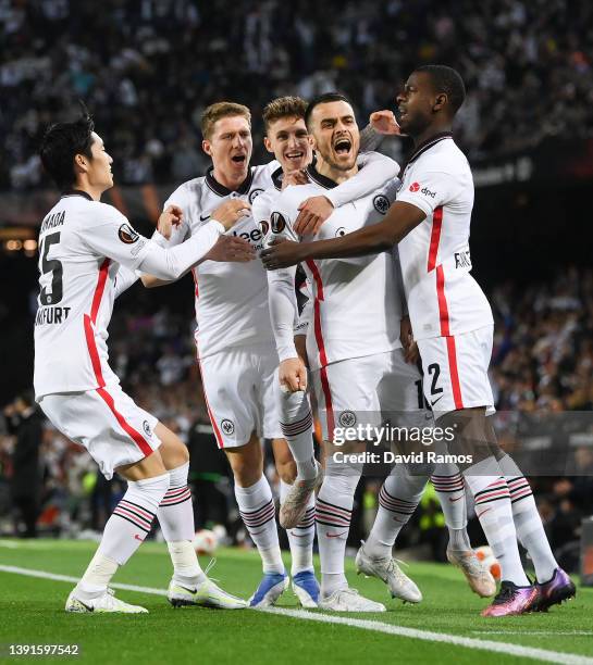 Filip Kostic of Eintracht Frankfurt celebrates with team mates after scoring their sides first goal during the UEFA Europa League Quarter Final Leg...