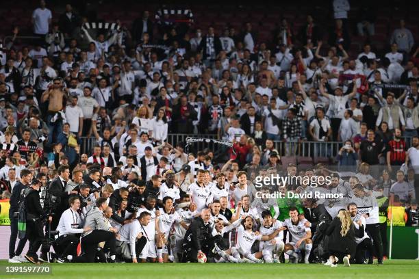 Eintracht Frankfurt players pose for a picture as they celebrate after the UEFA Europa League Quarter Final Leg Two match between FC Barcelona and...