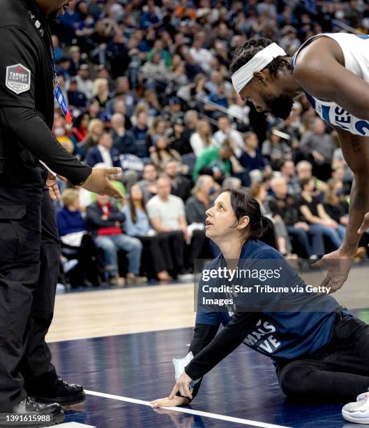 Woman tried to glue herself to the Target Center basketball court at Tuesday night's Minnesota Timberwolves game against the Los Angeles Clippers to...