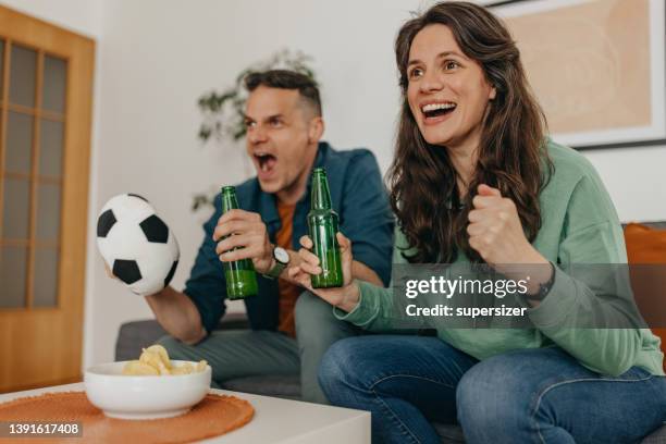 couple goals - finals game two stock pictures, royalty-free photos & images