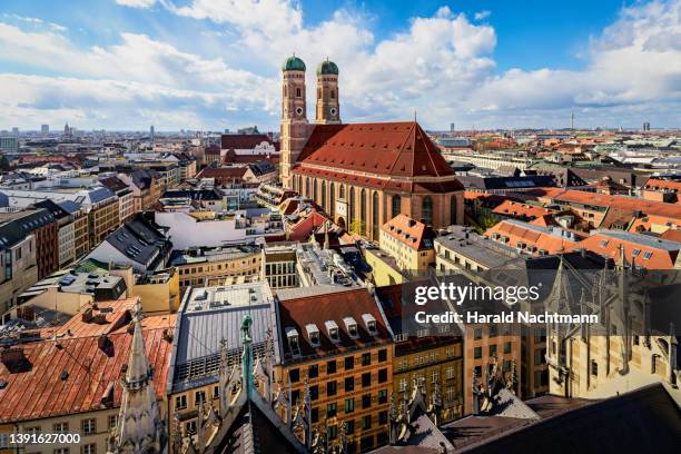 old town with cathedral against sky, munich, bavaria, germany - stadt münchen stock-fotos und bilder