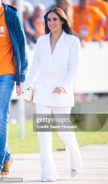 Meghan, Duchess of Sussex attends a reception for friends and family of competitors of the Invictus Games at Nations Home at Zuiderpark on April 15,...