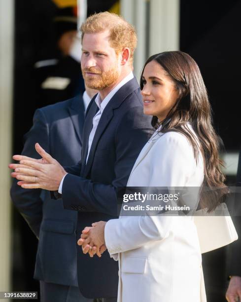 Prince Harry, Duke of Sussex and Meghan, Duchess of Sussex attend a reception for friends and family of competitors of the Invictus Games at Nations...