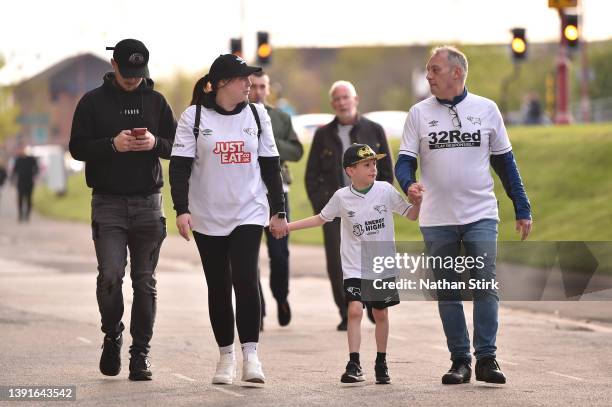 Derby County fans arrive at the stadium prior to the Sky Bet Championship match between Derby County and Fulham at Pride Park Stadium on April 15,...