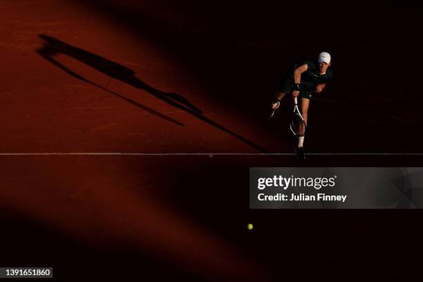 Jannik Sinner of Italy serves to Alexander Zverev of Germany in the quarter finals during day six of the Rolex Monte-Carlo Masters at Monte-Carlo...