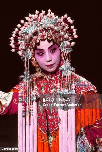 View of an unidentified actor in costume during an unspecified Peking Opera performance, Beijing, China, May 1986.