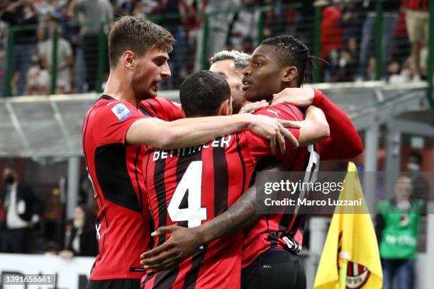 Rafael Leao of AC Milan celebrates with teammates after scoring their team's first goal during the Serie A match between AC Milan and Genoa CFC at...