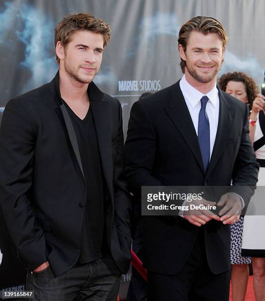 Chris Hemsworth and brother Liam Hemsworth arrive at the Los Angeles Premiere of "Thor" at the El Capitan Theater on May 2, 2011 in Hollywood,...