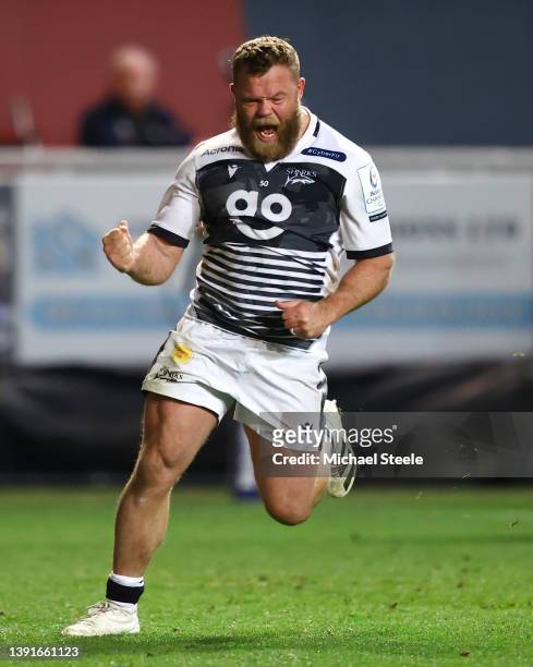 Akker van der Merwe of Sale Sharks celebrates scoring their sides second try during the Heineken Champions Cup Round of 16 Leg Two match between...