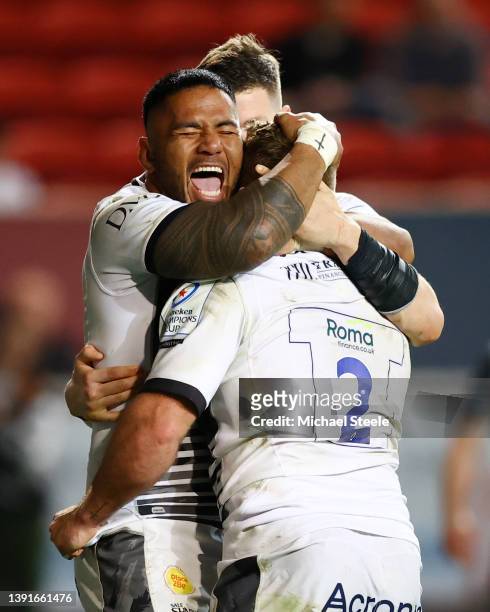 Manu Tuilagi celebrates the second try with scorer Akker van der Merwe of Sale Sharks during the Heineken Champions Cup Round of 16 Leg Two match...