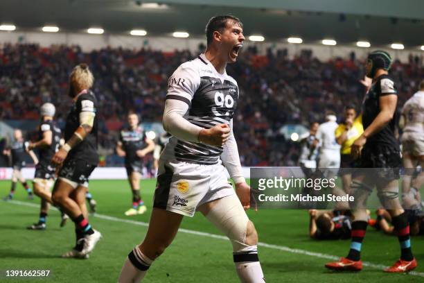 Tom Roebuck of Sale Sharks celebrates scoring their sides third try during the Heineken Champions Cup Round of 16 Leg Two match between Bristol Bears...