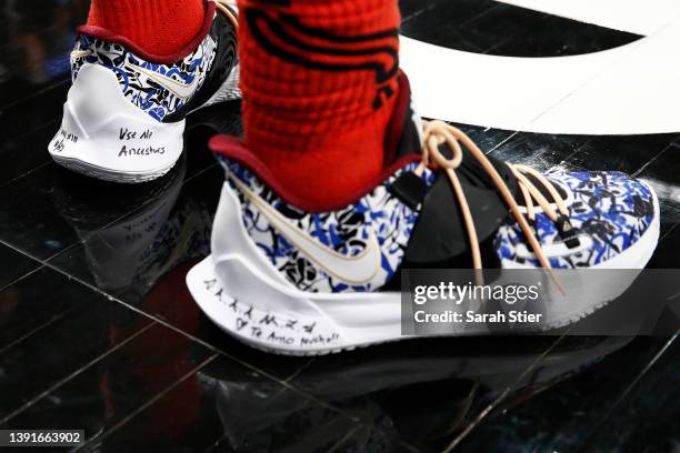 Detail of the Nike sneakers worn by Kyrie Irving of the Brooklyn Nets during the second half of the Eastern Conference 2022 Play-In Tournament...