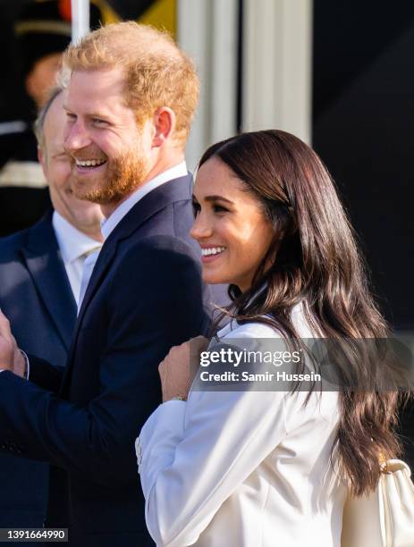 Prince Harry, Duke of Sussex and Meghan, Duchess of Sussex attend a reception for friends and family of competitors of the Invictus Games at Nations...