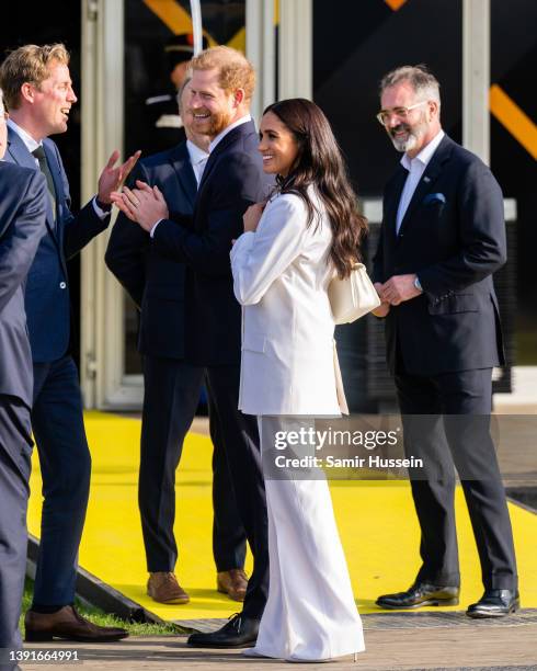 Prince Harry, Duke of Sussex and Meghan, Duchess of Sussex attend a reception for friends and family of competitors of the Invictus Games at Nations...