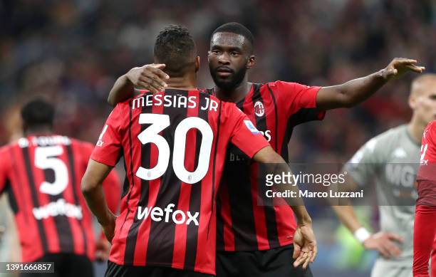 Junior Messias celebrates with Fikayo Tomori of AC Milan after scoring their team's second goal during the Serie A match between AC Milan and Genoa...