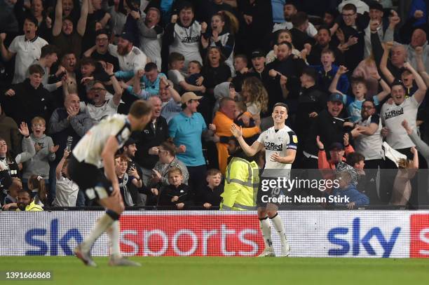 Tom Lawrence of Derby County celebrates after Tosin Adarabioyo of Fulham scored an own goal during the Sky Bet Championship match between Derby...