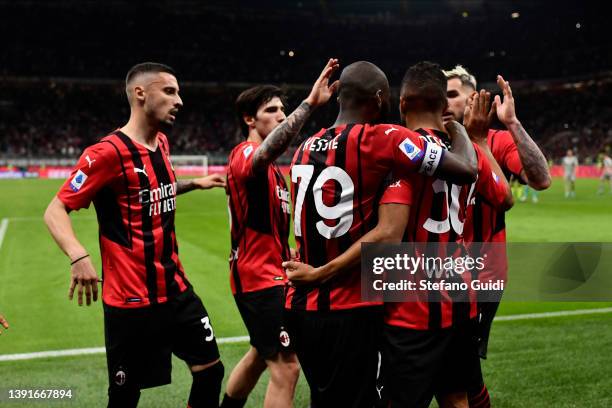 Junior Messias of AC Milan celebrates a goal with his team during the Serie A match between AC Milan and Genoa CFC at Stadio Giuseppe Meazza on April...