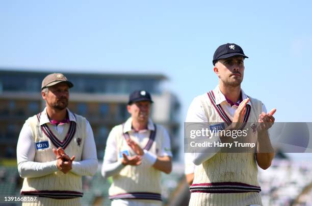 Ben Green, James Hildreth and Peter Siddle of Somerset look on during Day Two of the LV= Insurance County Championship match between Somerset and...