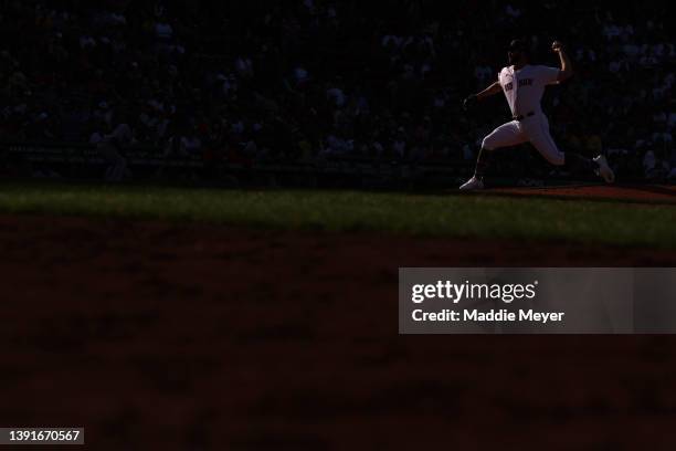 Austin Davis of the Boston Red Sox throws against the Minnesota Twins during the eighth inning on Opening Day at Fenway Park on April 15, 2022 in...