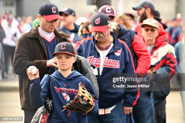 Cleveland Guardians fan waits to enter the ballpark prior to the home opener against the San Francisco Giants at Progressive Field on April 15, 2022...