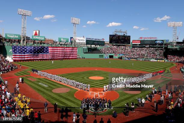 General view of Fenway Park during the singing of the national anthem on Opening Day before the game between the Boston Red Sox and the Minnesota...