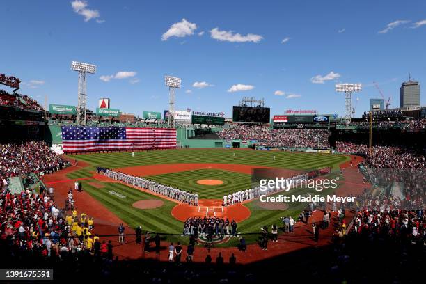 General view of Fenway Park during the singing of the national anthem on Opening Day before the game between the Boston Red Sox and the Minnesota...