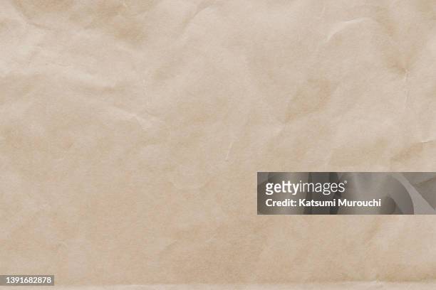 brown paper texture background - packpapier stock-fotos und bilder