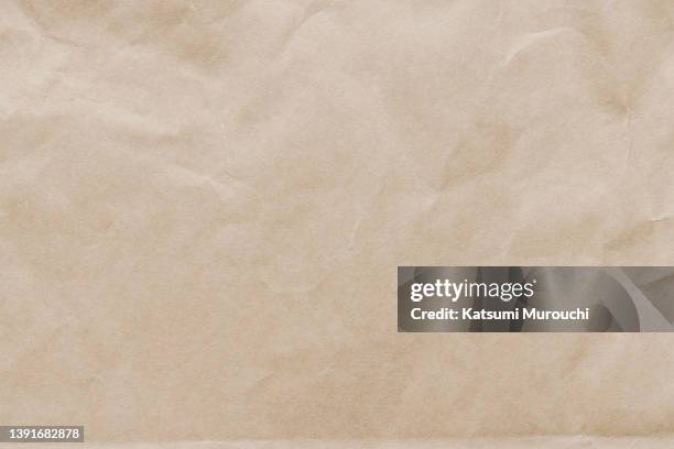 brown paper texture background - brown paper stock pictures, royalty-free photos & images