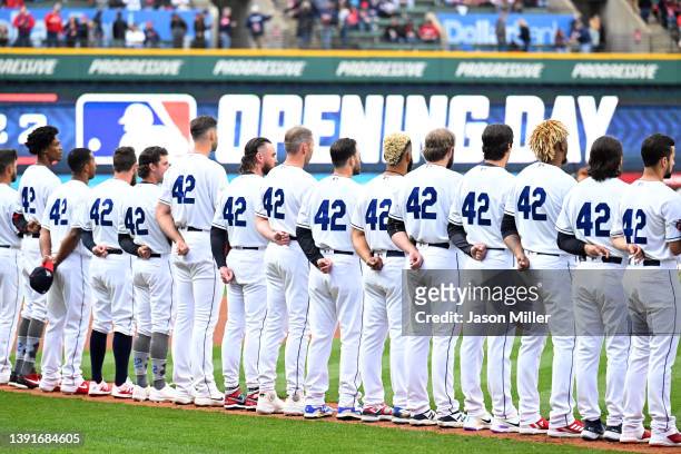 The Cleveland Guardians during the national anthem prior to the home opener against the San Francisco Giants at Progressive Field on April 15, 2022...