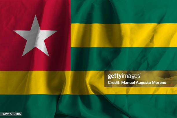 flag of togo - bandeira togolesa imagens e fotografias de stock