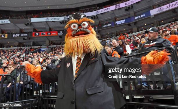 Gritty the mascot of the Philadelphia Flyers celebrating Lou Nolan 50th anniversary as the teams public address announcer against the Anaheim Ducks...