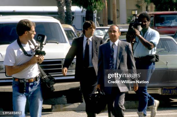 American actor Christian Brando , eldest child of American actor Marlon Brando , and American lawyer Robert L. Shapiro walk to the courthouse during...