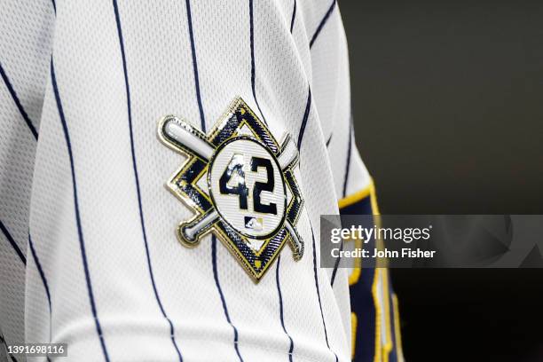 Detailed view of a Jackie Robinson logo worn on the sleeve of Willy Adames of the Milwaukee Brewers during the game against the St. Louis Cardinals...