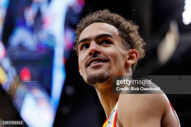 Trae Young of the Atlanta Hawks reacts during the second half against the Cleveland Cavaliers at Rocket Mortgage Fieldhouse on April 15, 2022 in...