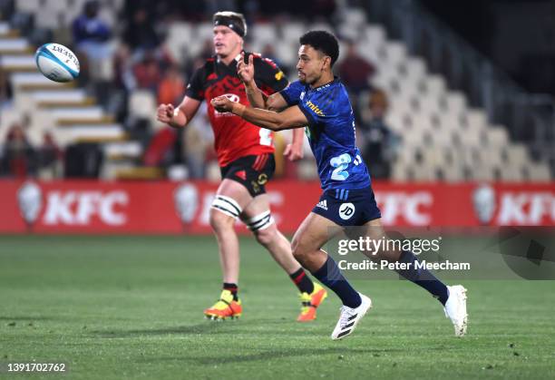 Stephen Perofeta from the Blues sends the ball wide during the round four Super Rugby Pacific match between the Crusaders and the Chiefs at...