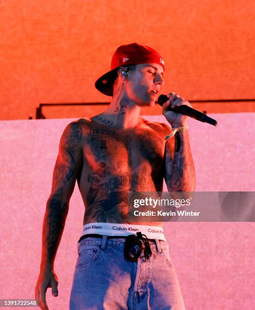 Justin Bieber performs with Daniel Caesar onstage at the Coachella Stage during the 2022 Coachella Valley Music And Arts Festival on April 15, 2022...