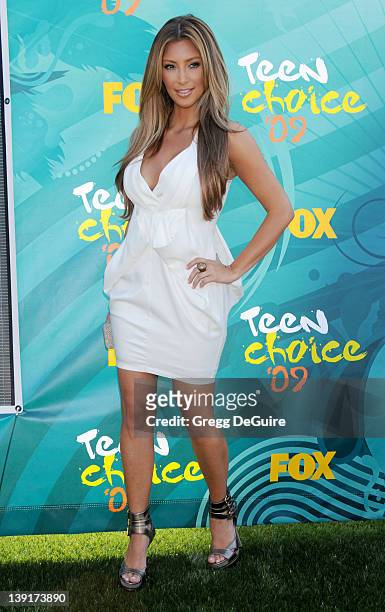 Kim Kardashian arrives at Teen Choice 2009 held at the Universal Amphitheater in Universal City, California on August 9, 2009.